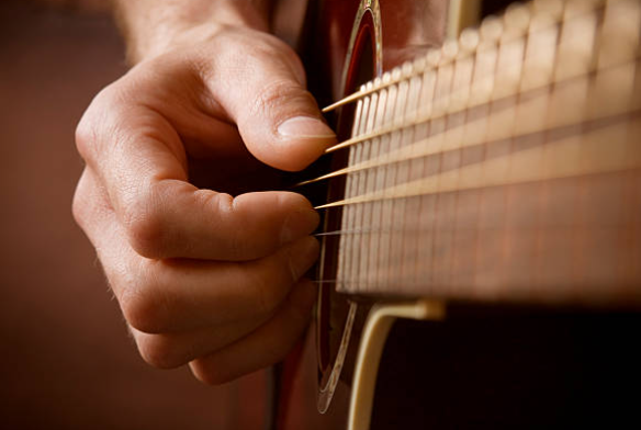 The Importance of Thumb Placement in Guitar Playing: Tips for Beginners